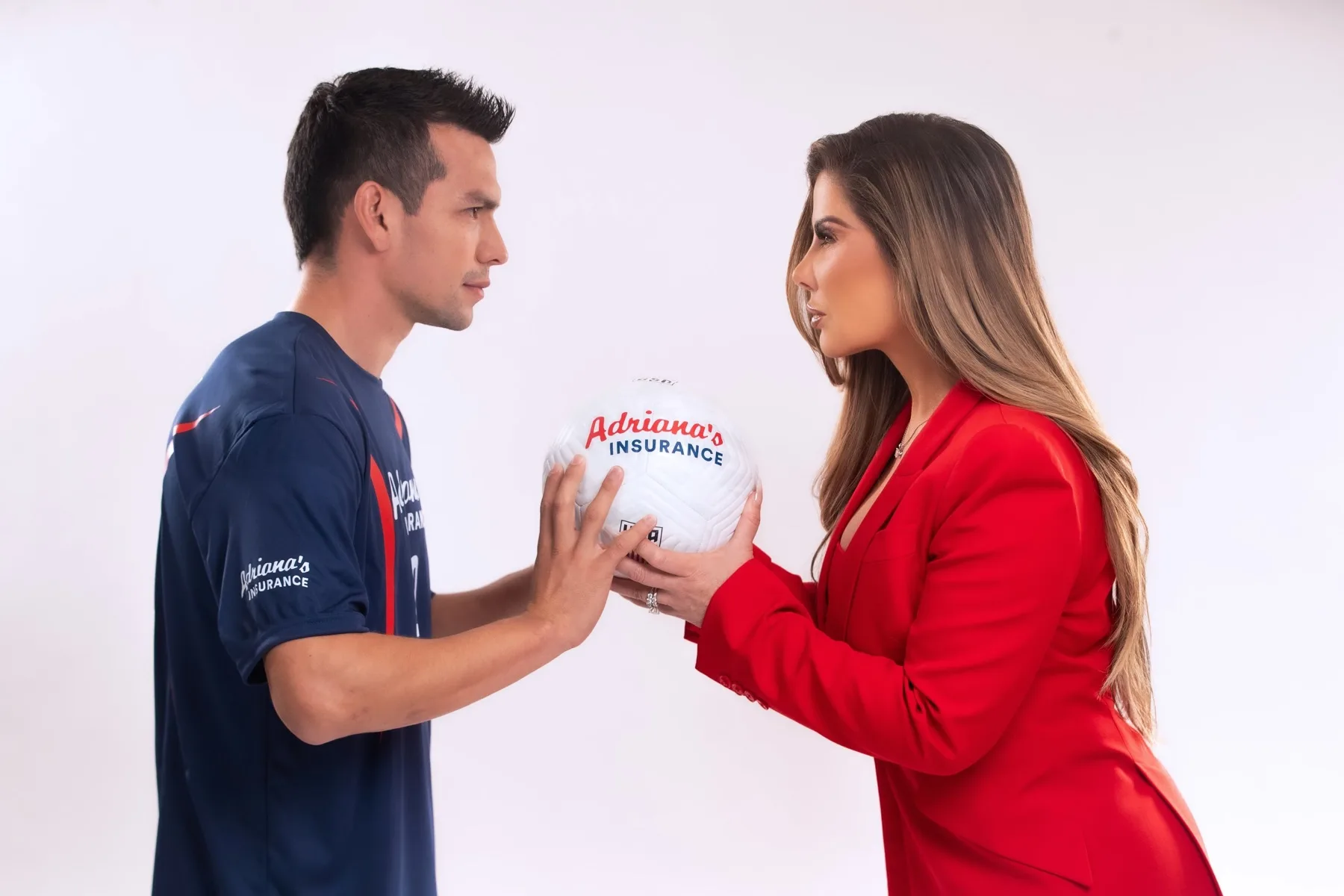 Adriana Gallardo and a soccer player holding an Adriana's Insurance ball