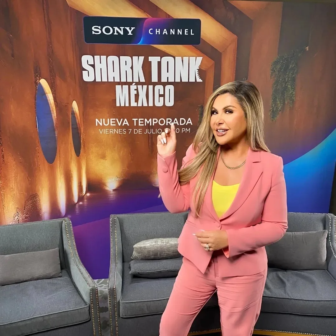 Adriana Gallardo in front of the Shark Tank México sign
